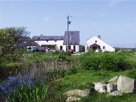 Picture of outdoor Alternative Centre from beyond pond